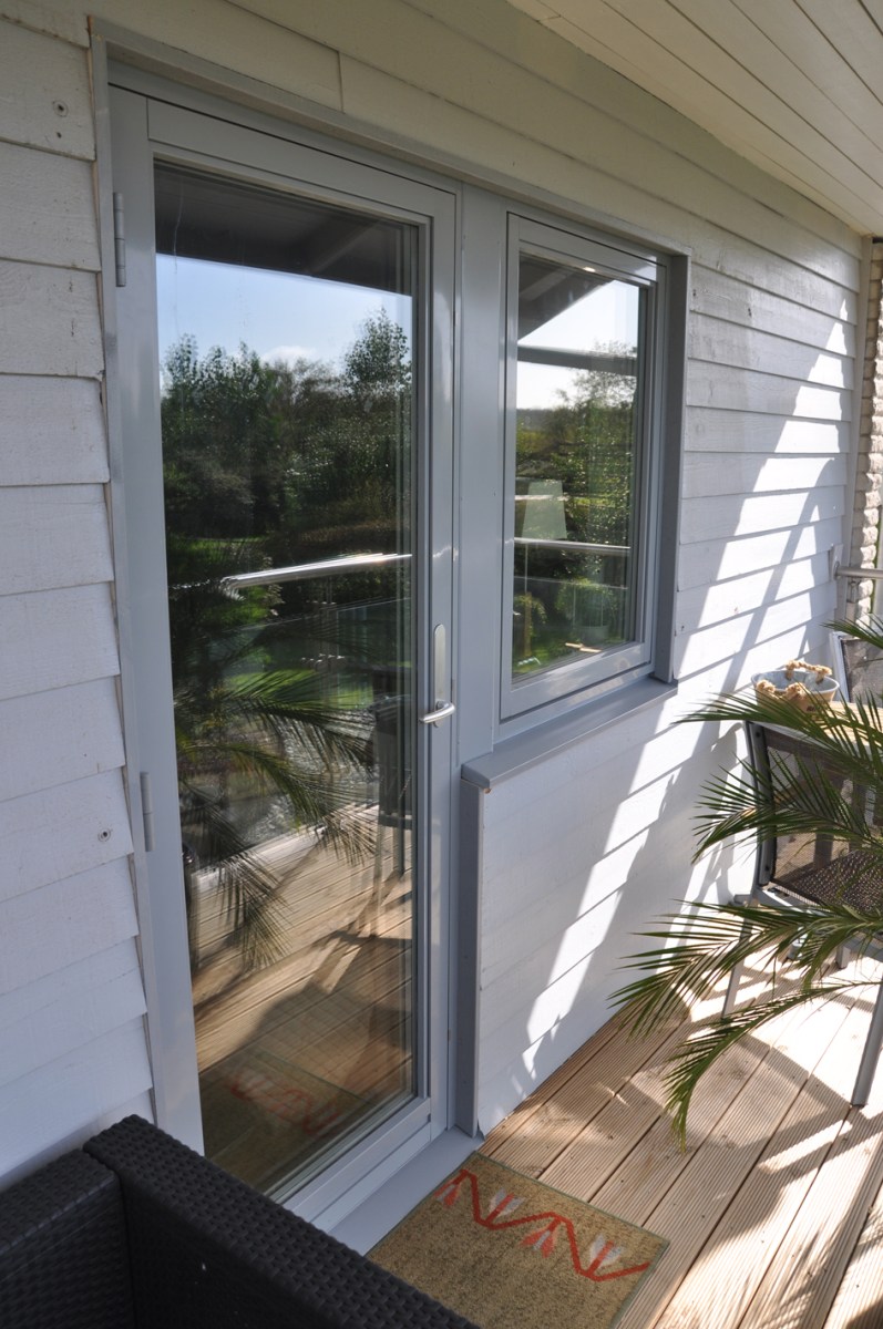 Glasad altandörr med lackad aluminium. Bild: Patrik Ferdinandsson, Fönsterbolaget i Halland (Norlux Fönster)